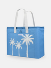 Envoy Rectangular Island Life XL Cooler in blue with white palm trees and white handles, featuring a zippered top and front pocket.
