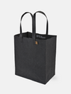 Market Tote washable paper bag in black with long handles, perfect for market trips and reusable gift wrapping.