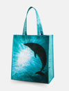 Reusable Shopper Tote featuring ocean plastic fabric and dolphin print, perfect for grocery trips and everyday use.