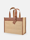 Tote bag with brown leather accents on a white background