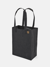Market Tote Mini in black with long handles, compact design ideal for daily essentials and light lunches.