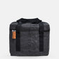 Walrus Lunch Cooler in black with sturdy handles and zipper, perfect for insulated lunch storage on the go.