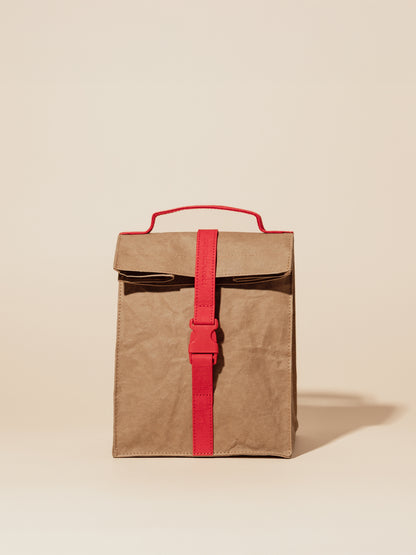 Paper Sack Lunch Cooler with fold-top design, red quick-release buckle, reusable insulated brown bag for lasting chill.
