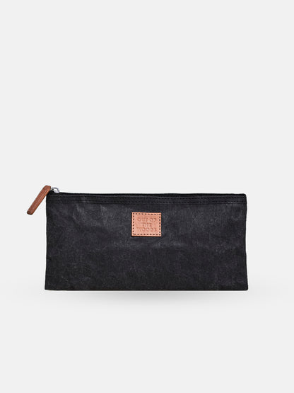 Essentials Pouch in black with water-resistant exterior and zipper, perfect for organizing everyday items.