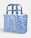 XL washable paper coastal beach tote bag with blue and white botanical pattern on a light gray background